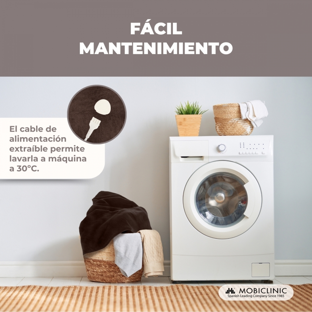 Una lavadora con una cesta de ropa y una planta. Fácil mantenimiento.