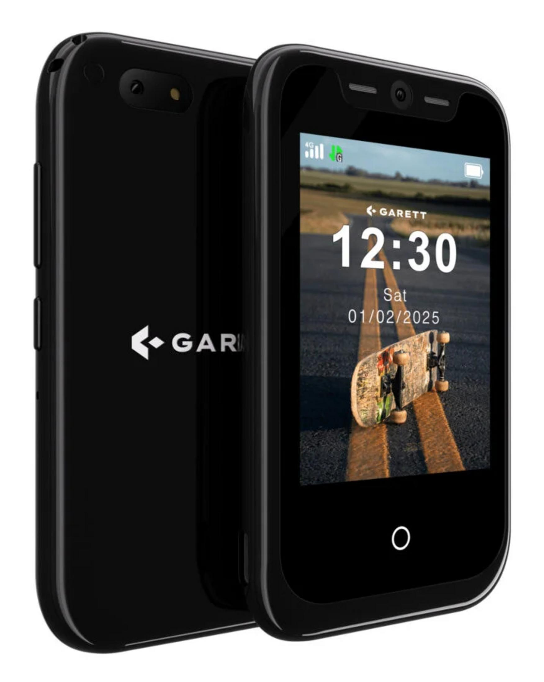 Czarny smartfon z deskorolką na drodze. 12:30.