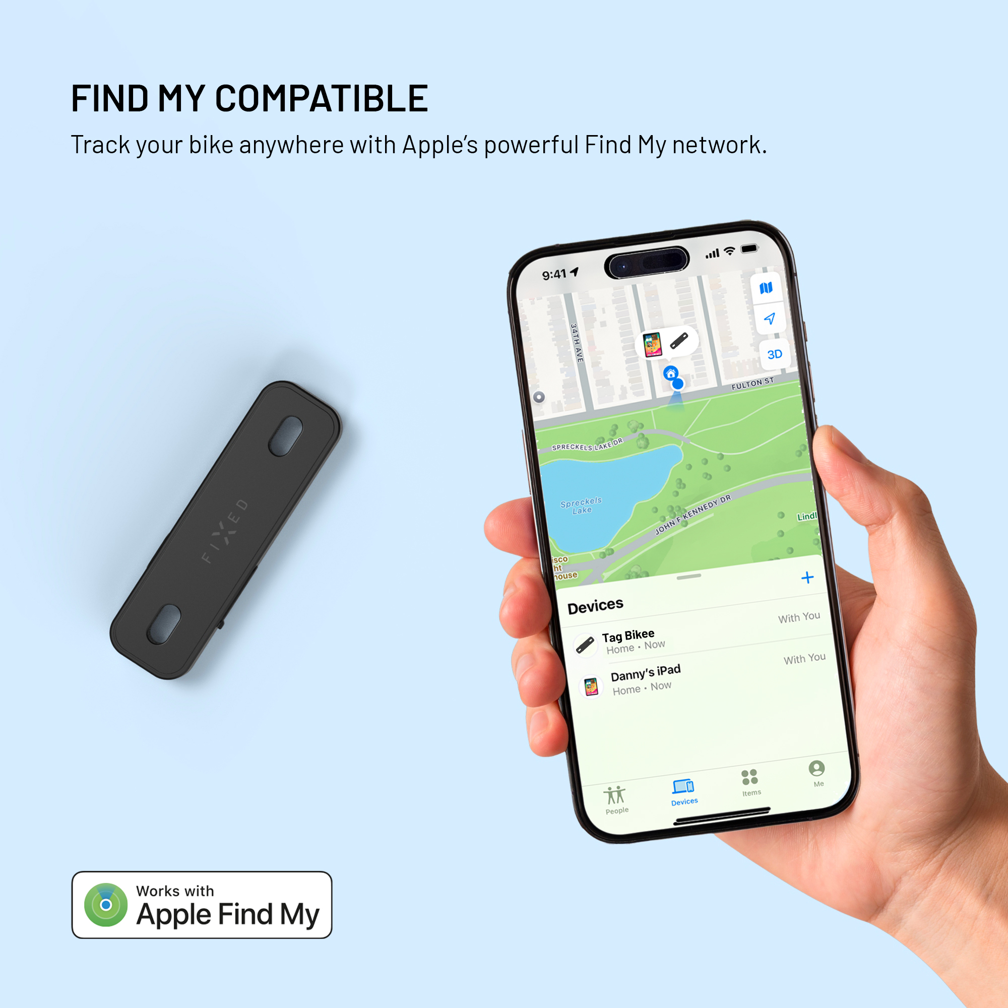 Ein schwarzer Fahrradtracker liegt neben einem iPhone, das die Find My App zeigt.