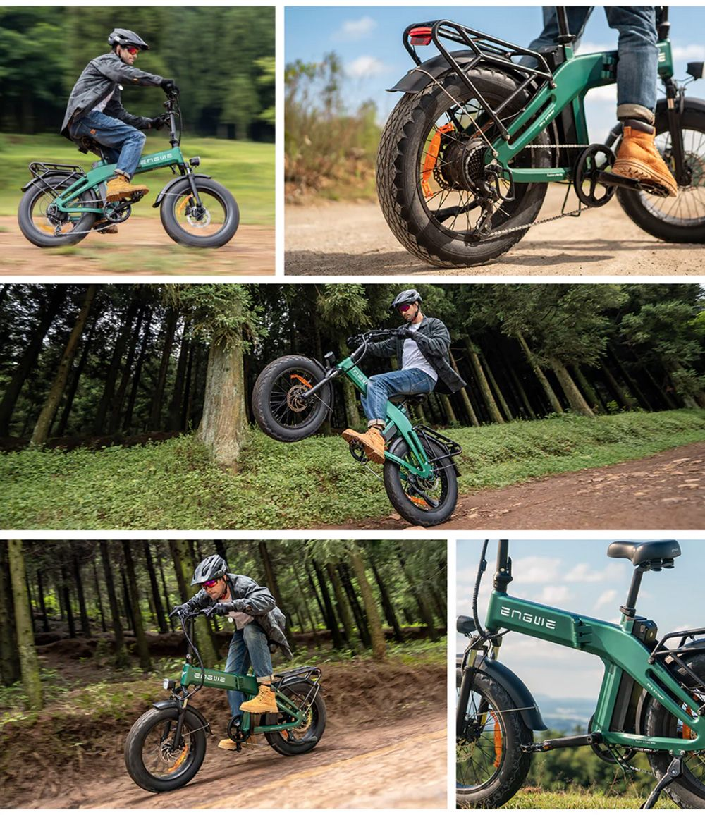 Uomo su e-bike verde nel bosco, impennata. Primo piano ruota.