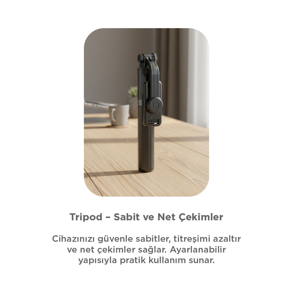 Ahşap bir masanın üzerinde duran siyah telefon tripod selfie çubuğu.