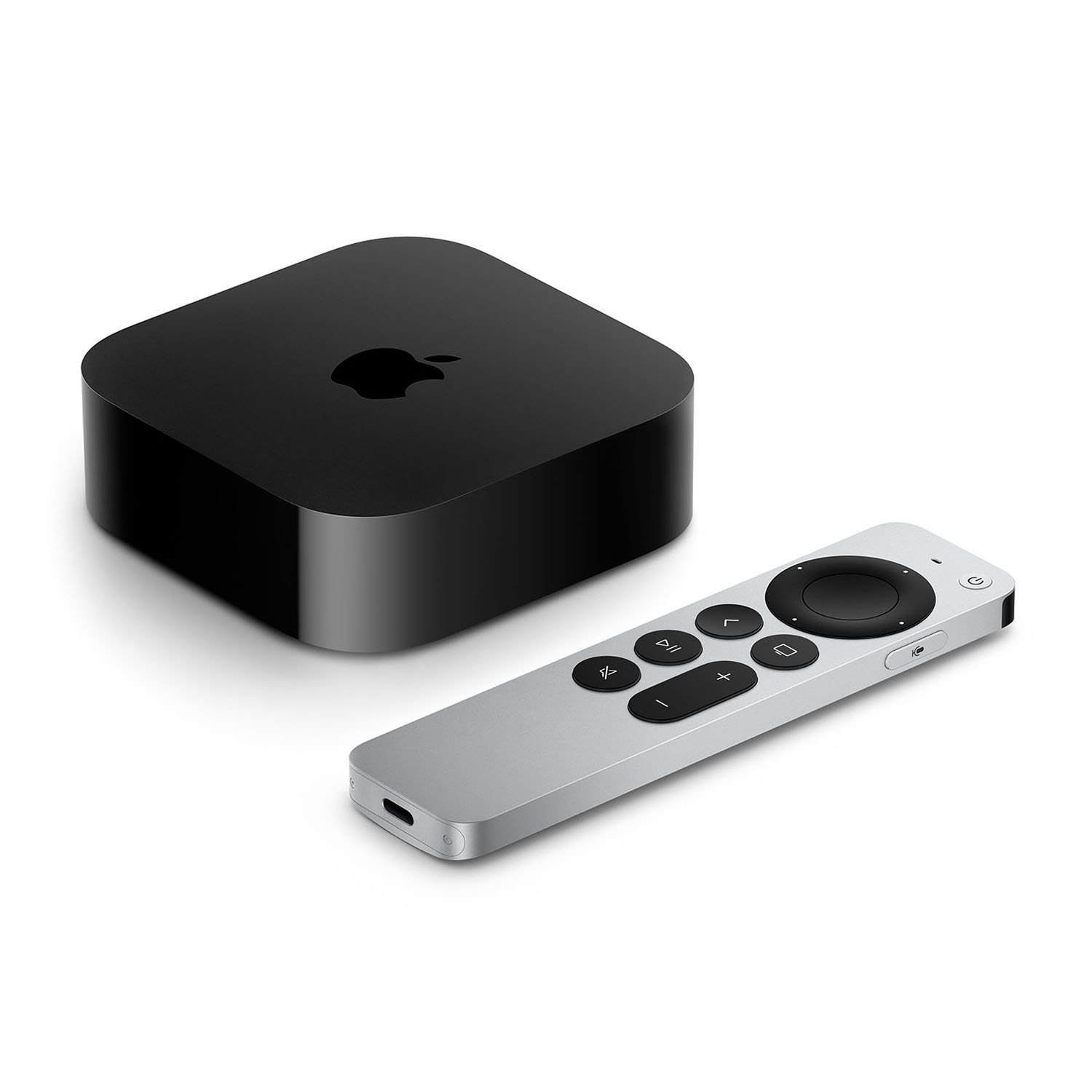 Un Apple TV nero e un telecomando argentato con pulsanti neri su sfondo bianco.