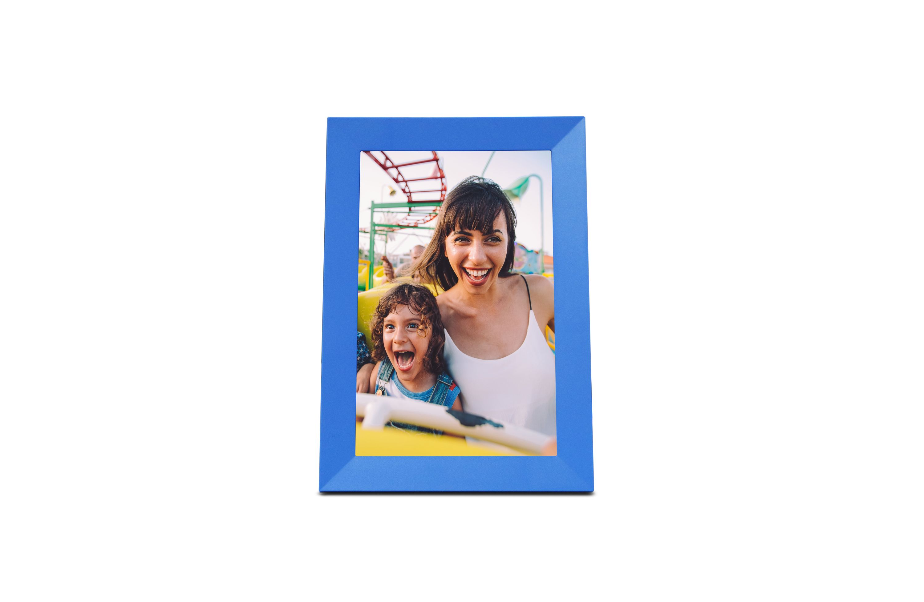 Two people on a roller coaster ride, smiling and screaming.