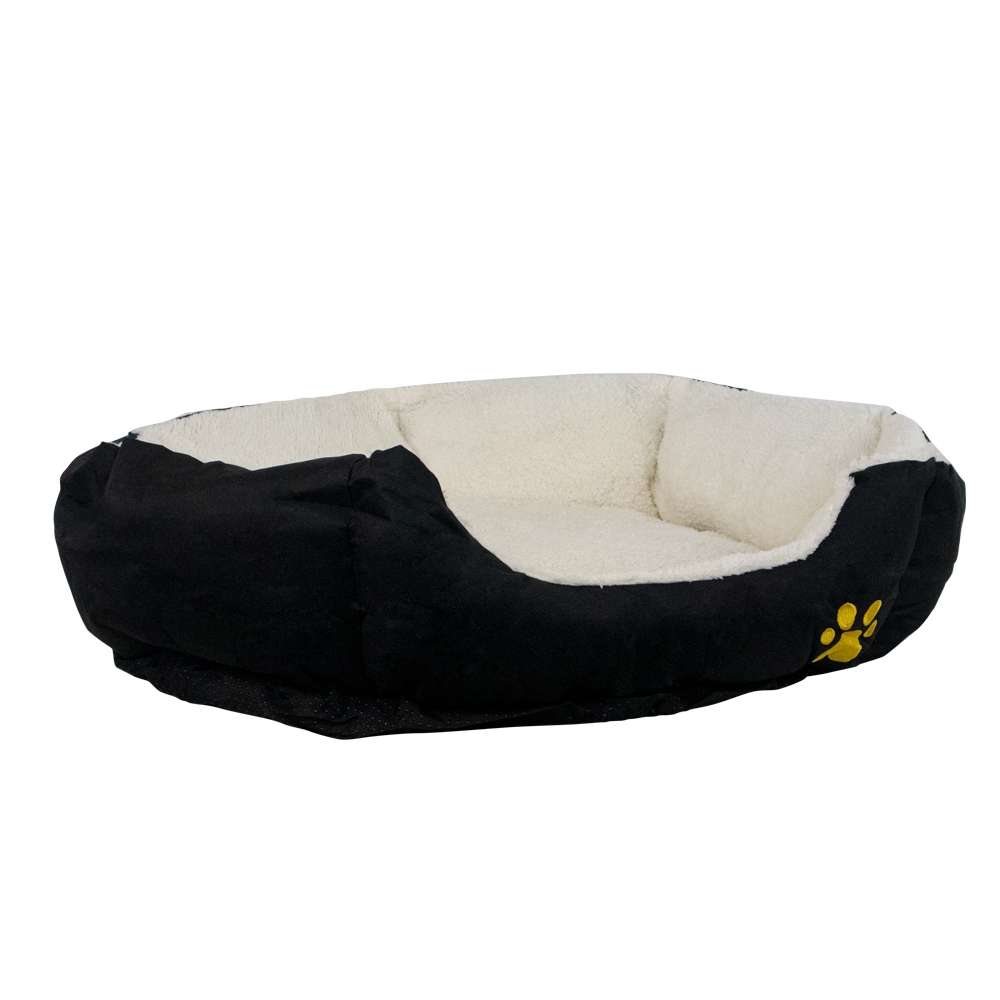 Una cama negra para perros con interior suave y crema y una huella amarilla.