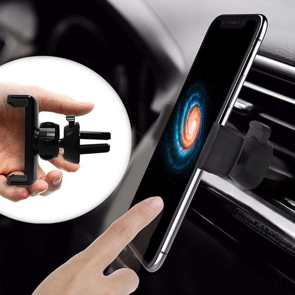 Mano sujetando soporte de teléfono para coche. Hay un teléfono.