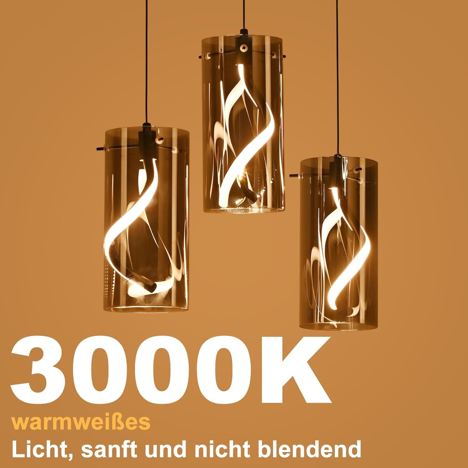Tre lampade a sospensione cilindriche con luce bianco caldo su sfondo arancione.