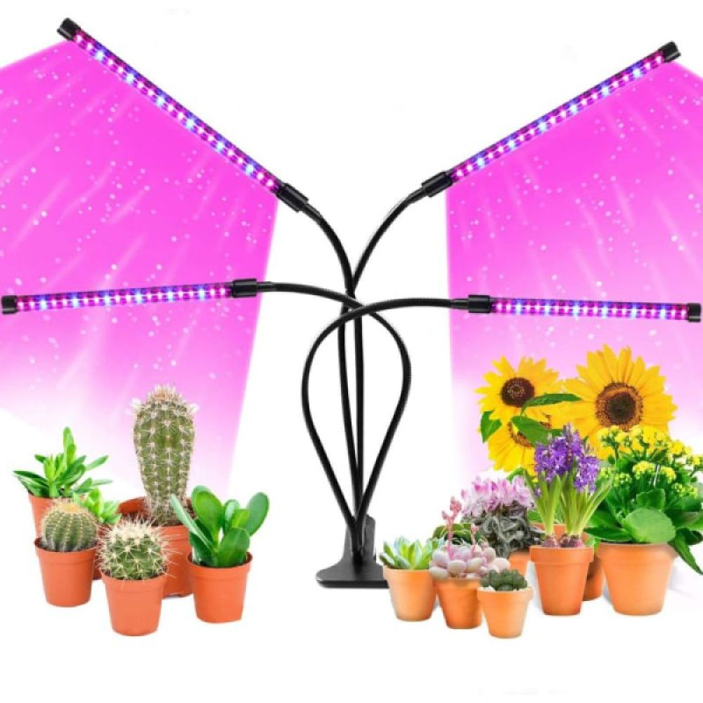 Pflanzenlampe mit vier Armen beleuchtet verschiedene Topfpflanzen, darunter Kakteen und Blumen.