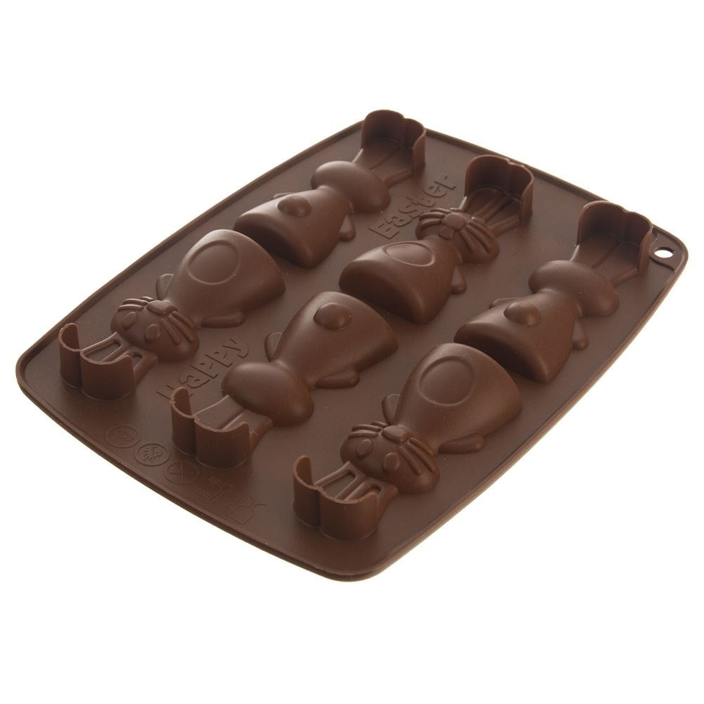 Molde de silicona marrón para conejitos de chocolate con texto "Felices Pascuas".