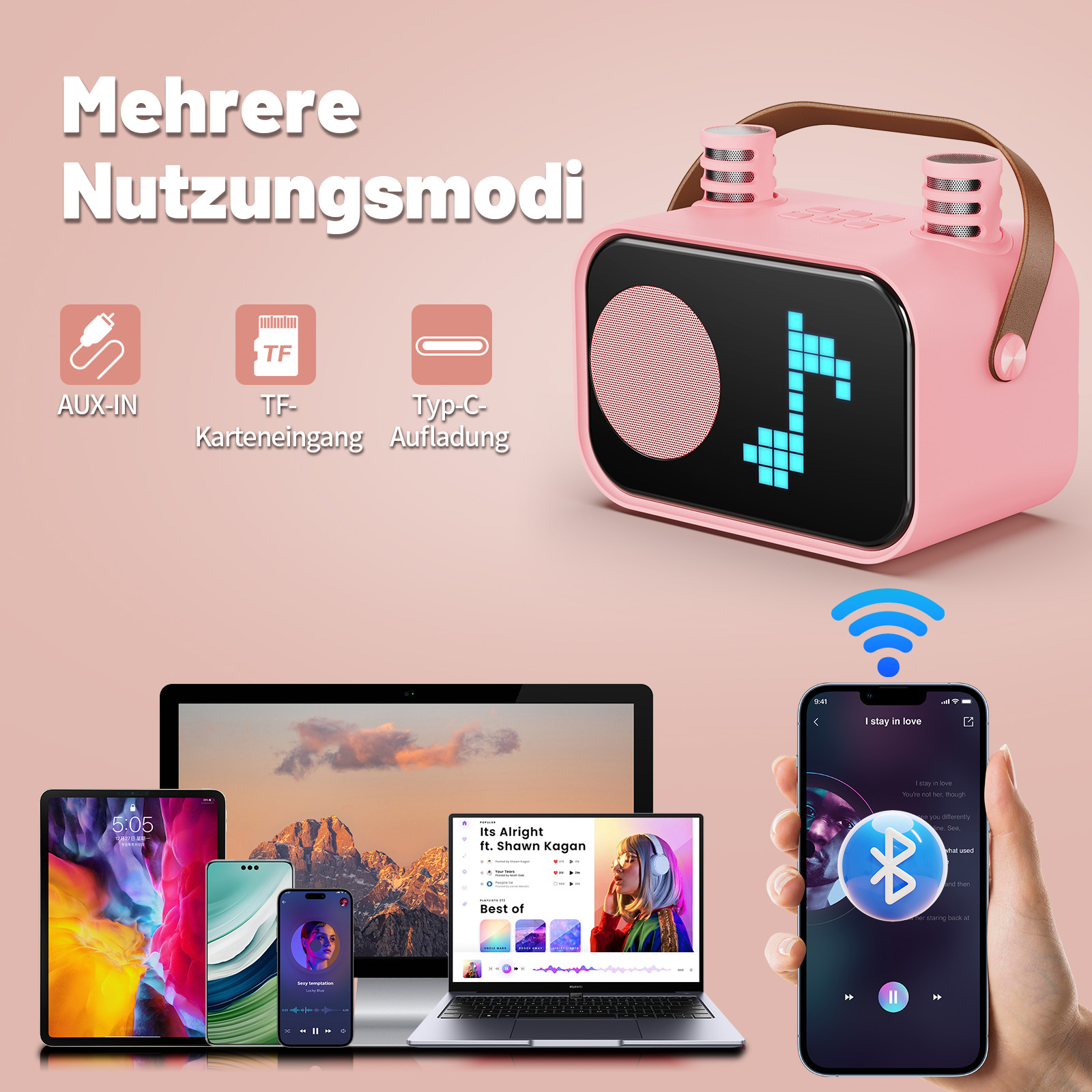 Ein rosafarbener Lautsprecher mit Musiknoten-Display, daneben diverse Geräte.
