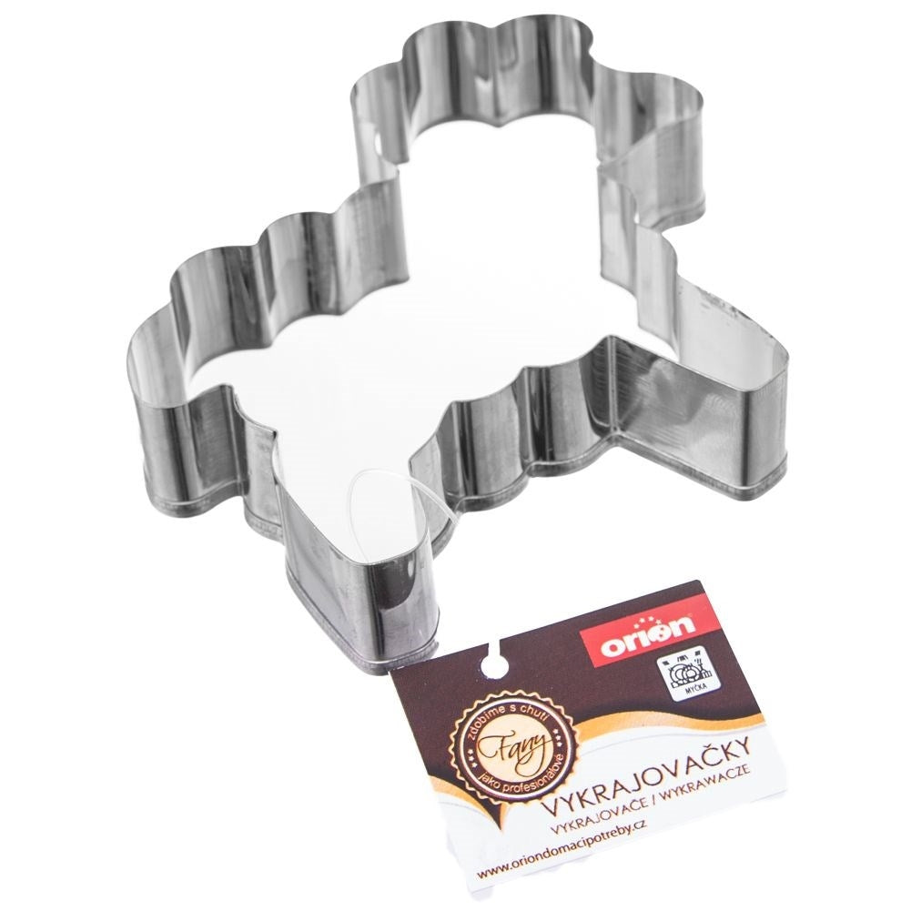 Un cortador de galletas de metal con forma de animal con una etiqueta.