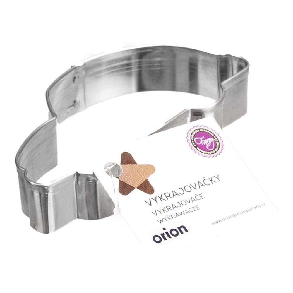 Un cortador de galletas de metal con forma de oso y una etiqueta.