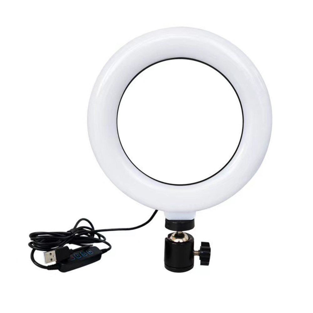 Ein weißer Ringlicht mit USB-Kabel und Halterung auf weißem Hintergrund.