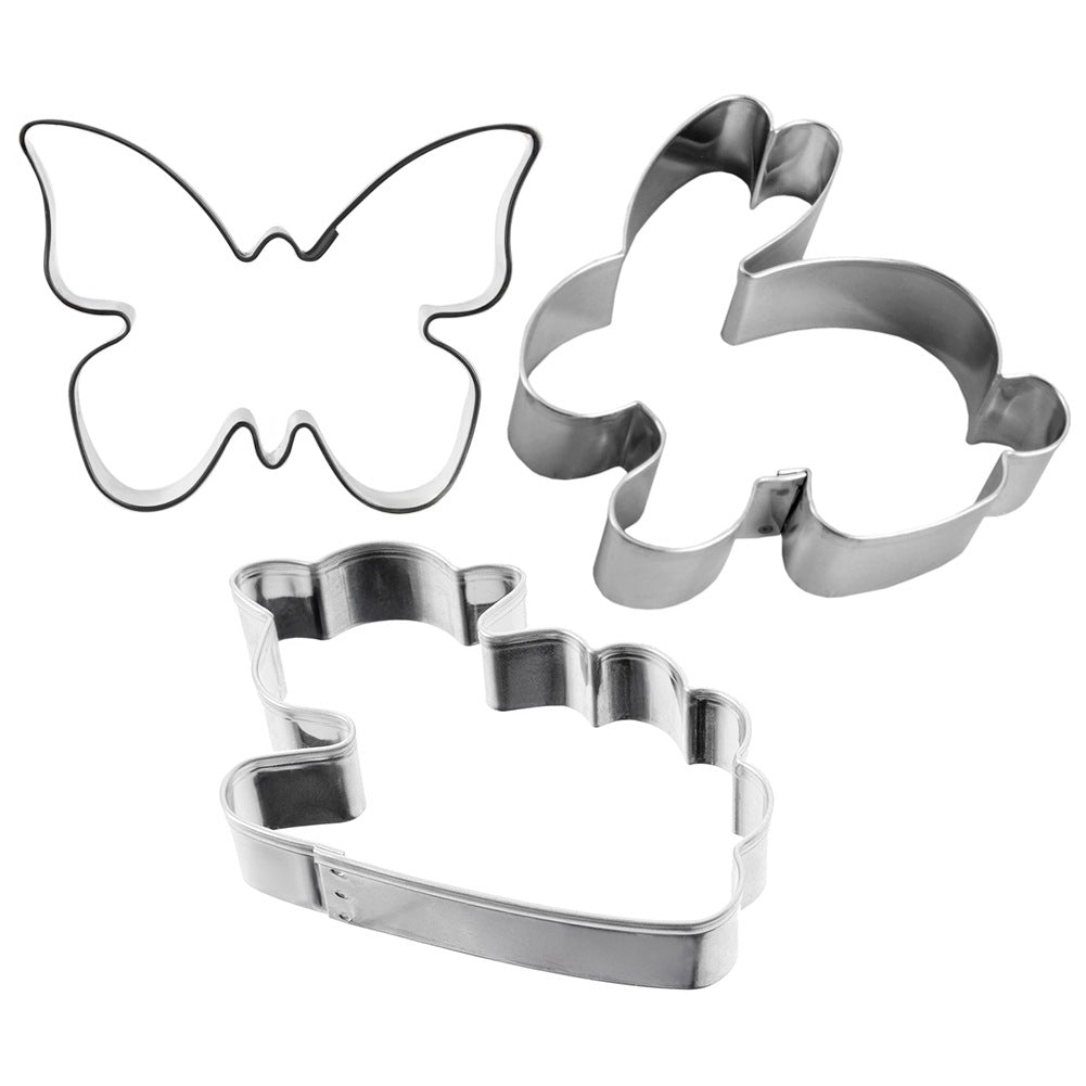 Tres cortadores de galletas: mariposa, conejito y nube.