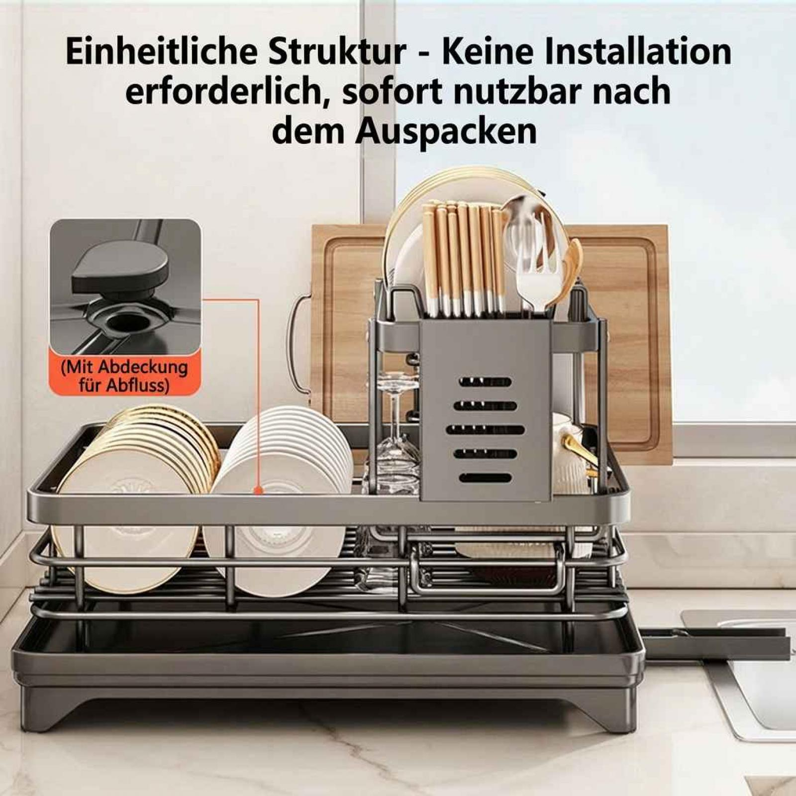 Grauer Abtropfgestell mit Tellern, Gläsern und Besteck. Mit Abflussabdeckung.