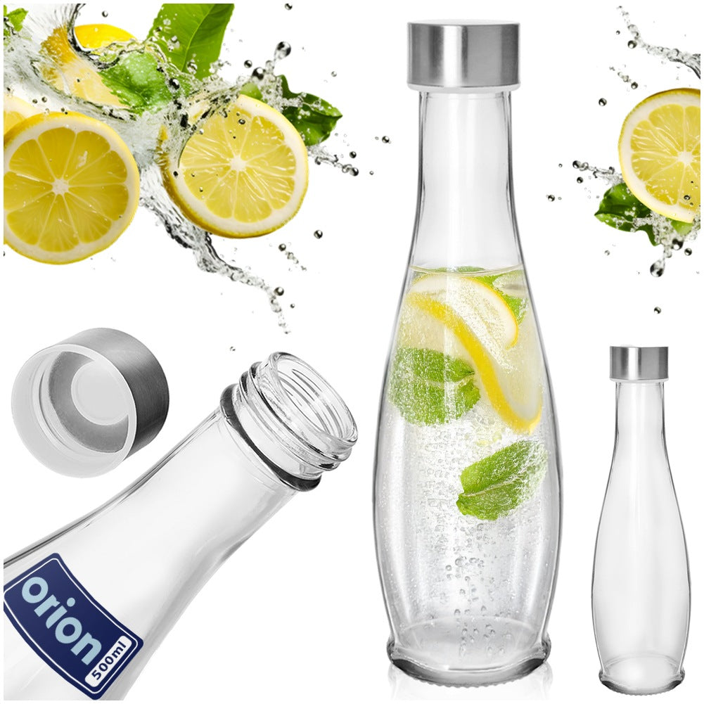 Botellas de vidrio con limón, menta y agua, con salpicaduras y tapa separada.
