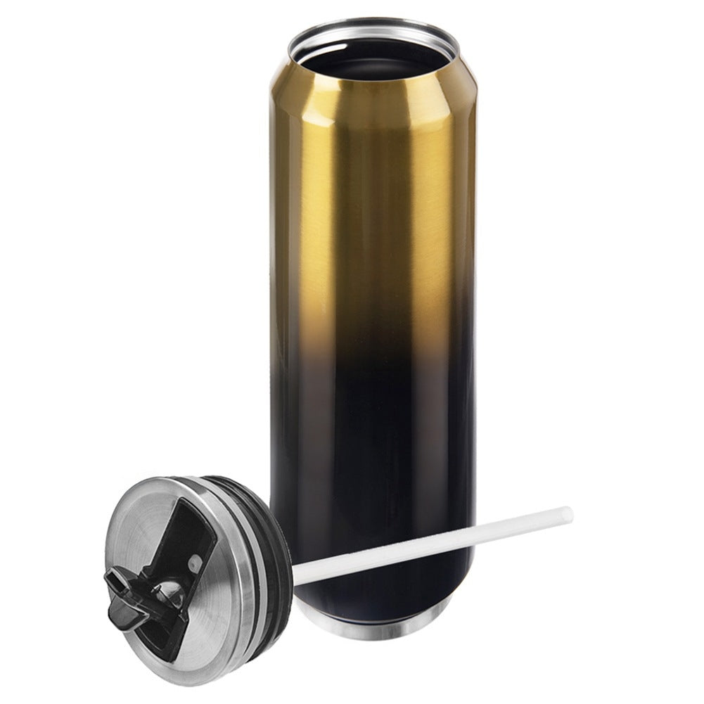 Vaso dorado y negro con forma de lata, sin tapa ni pajita.