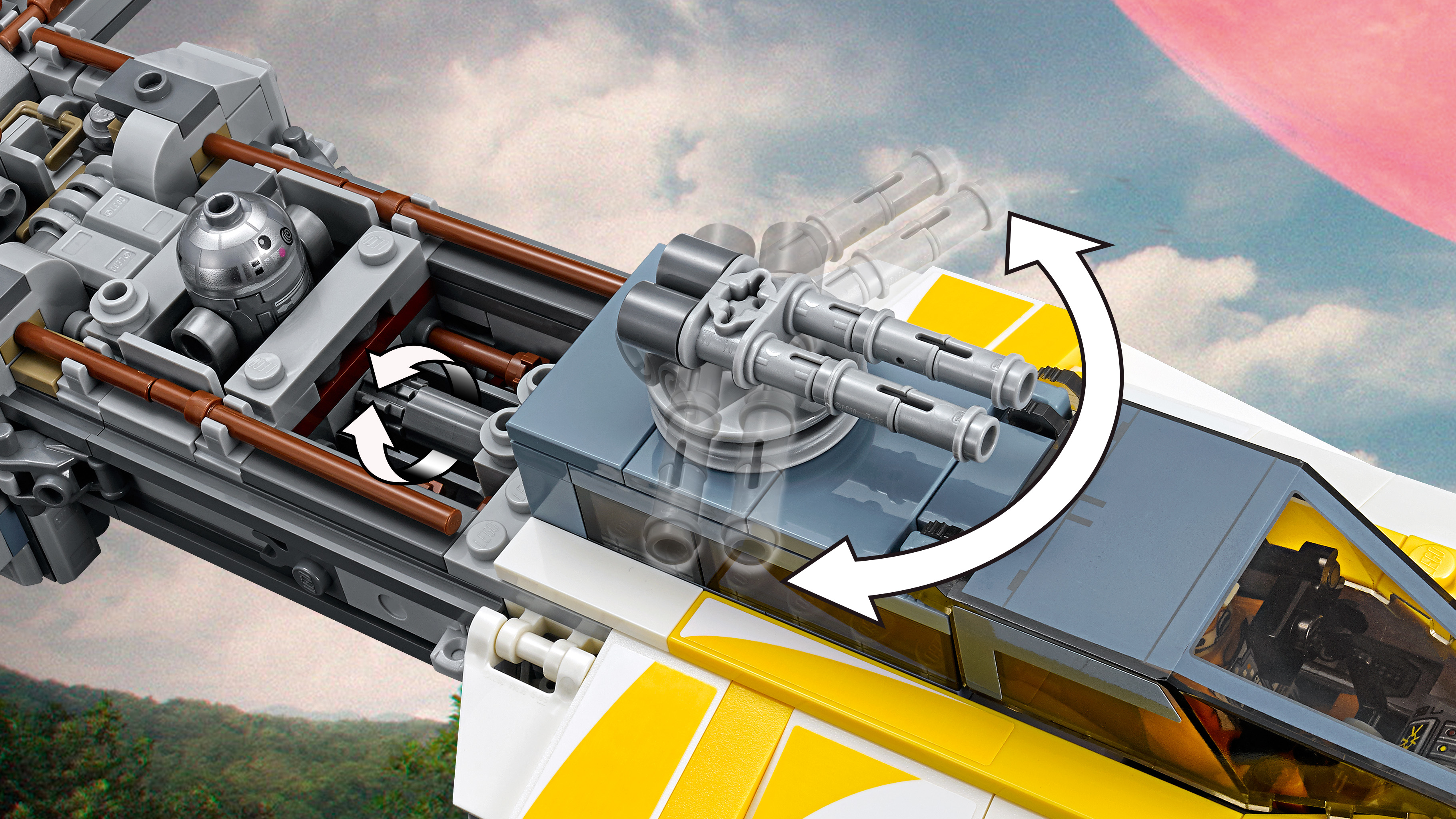 Statek kosmiczny Lego z żółtymi paskami i obracanymi działkami.