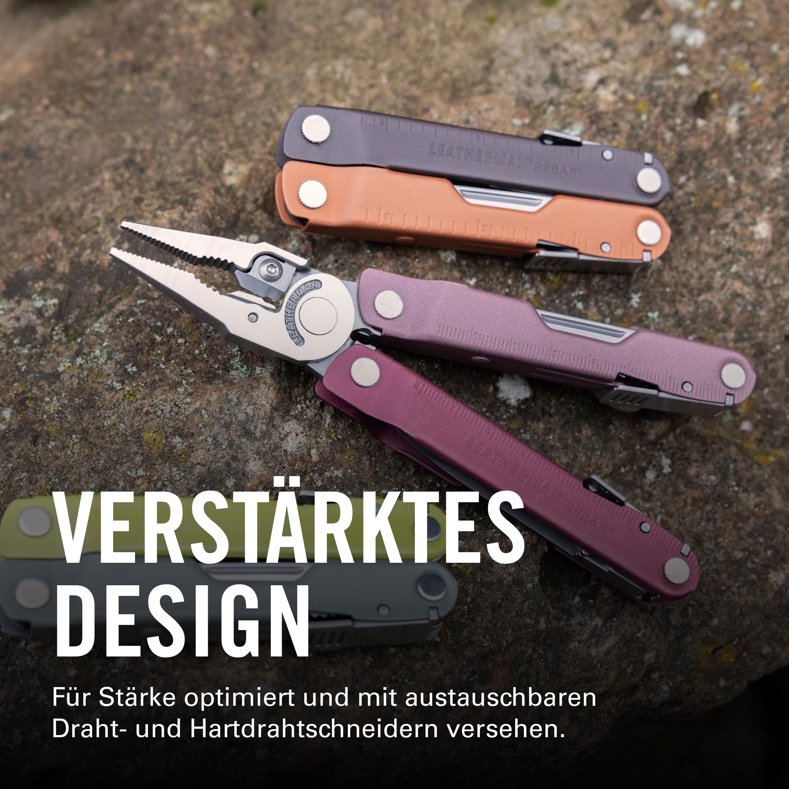 Drei Leatherman Multitools in Lila, Orange und Grau liegen auf Stein.