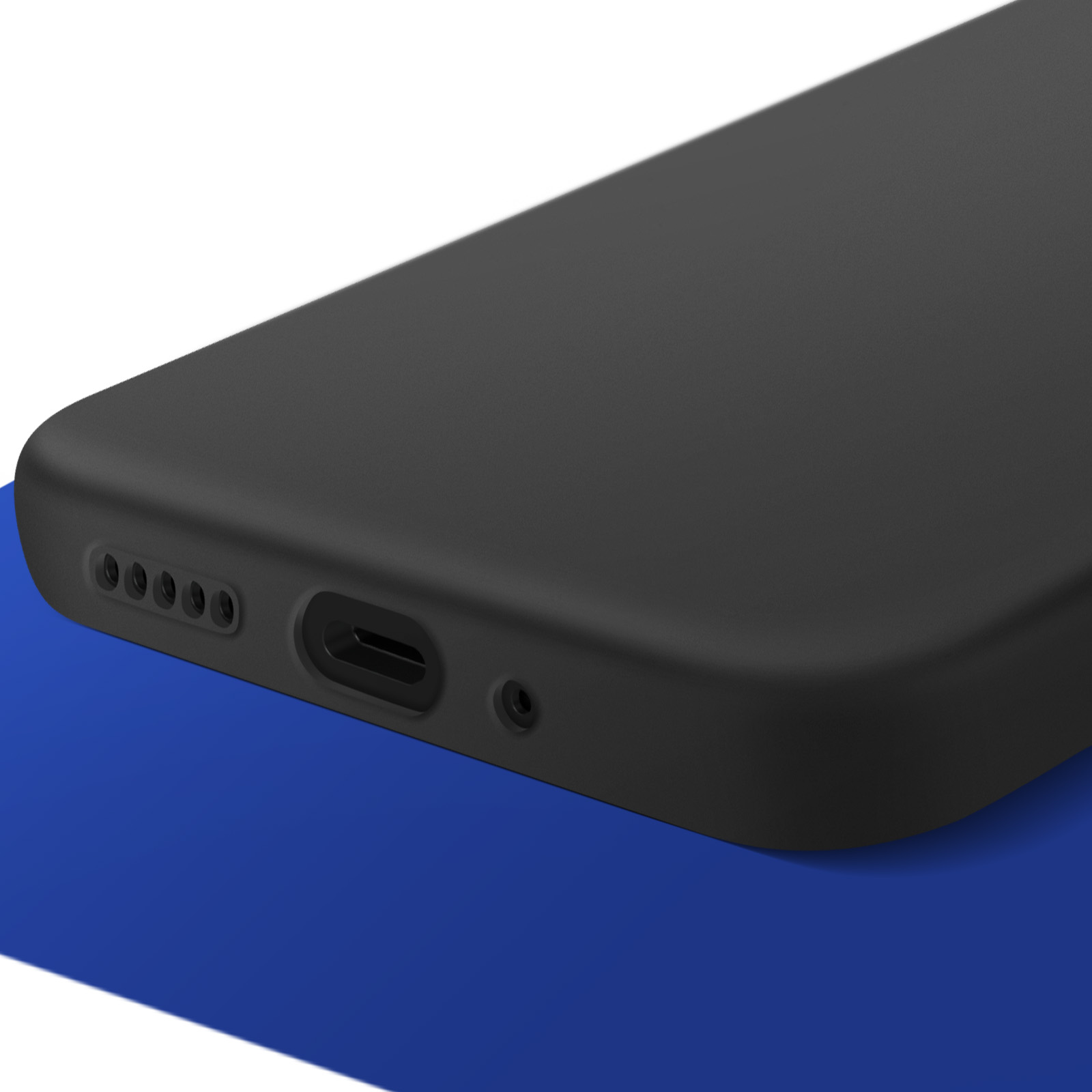 Zbliżenie na dół czarnego smartfona, pokazujące port ładowania i kratkę głośnika.