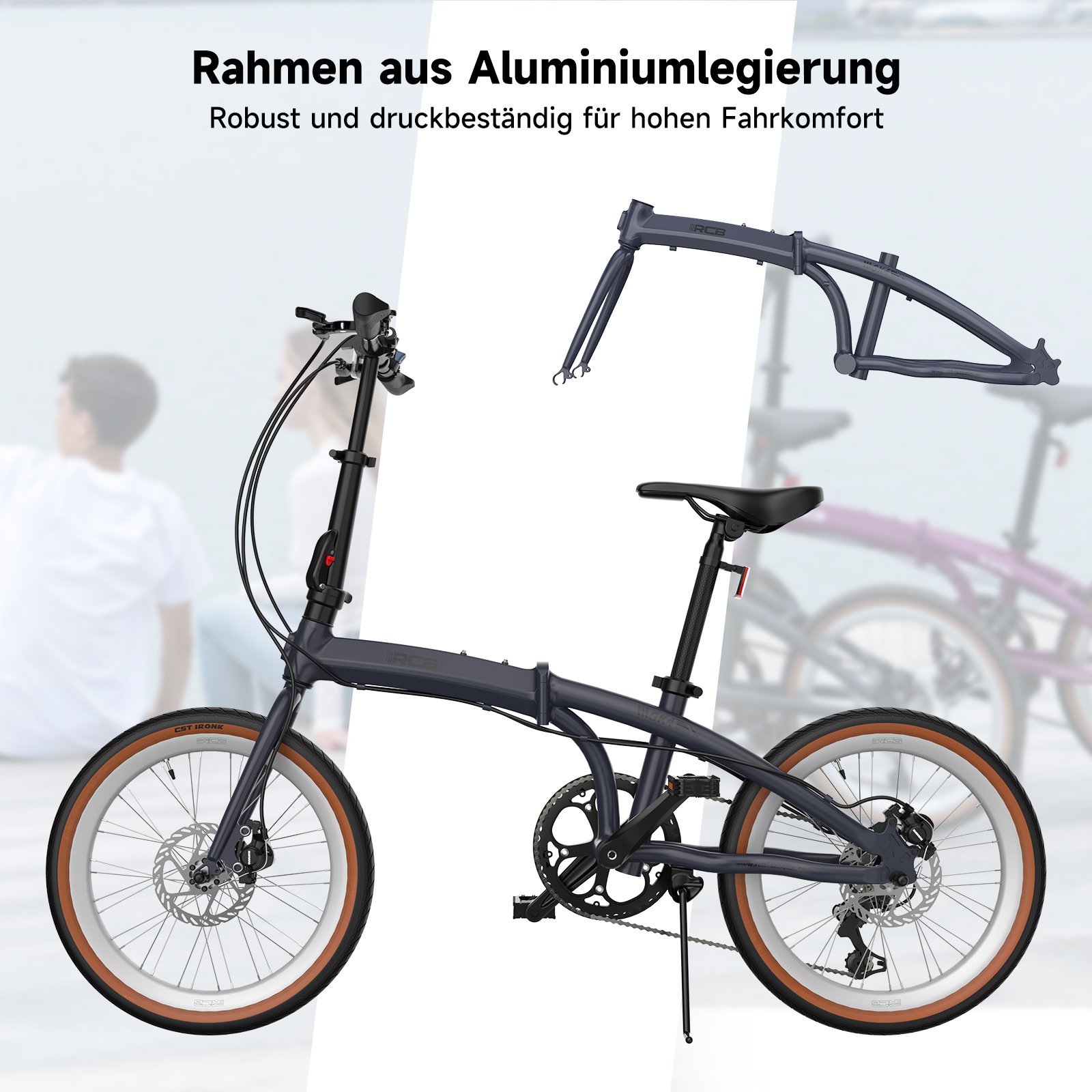 Ein dunkles Faltrad mit Aluminiumrahmen steht im Vordergrund. Ein weiterer Rahmen ist oben.