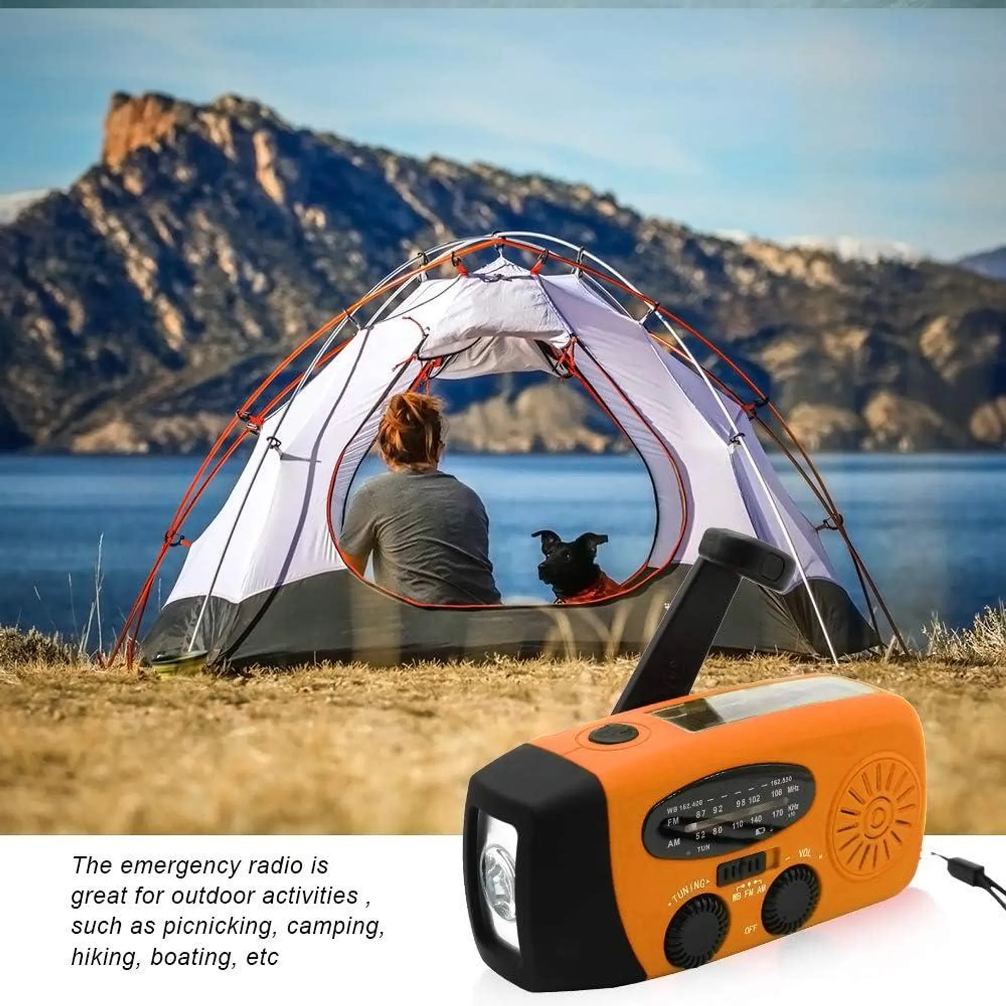Orange Notfallradio neben einem Zelt mit Person und Hund, Berge und See im Hintergrund.