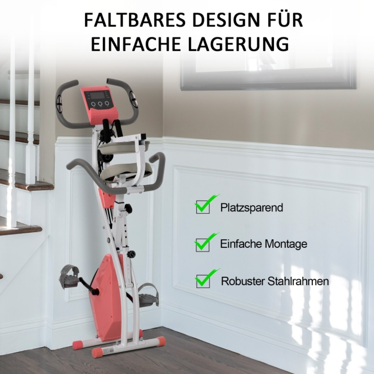 Składany rower stacjonarny w kolorze różowym i białym obok schodów.