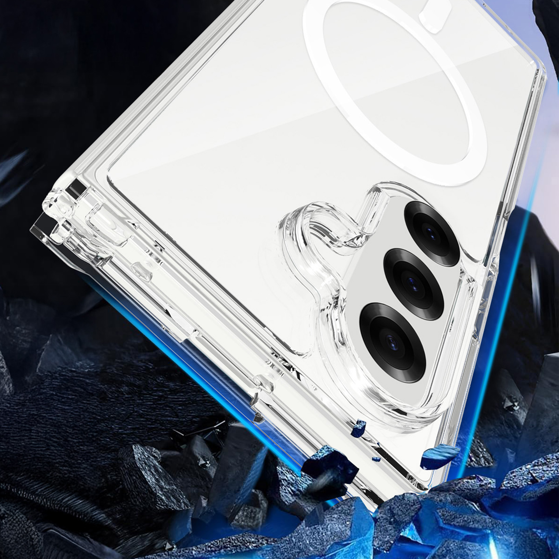 Przezroczyste etui na telefon z trzema kamerami i pierścieniem magnetycznym na tle potłuczonych skał.