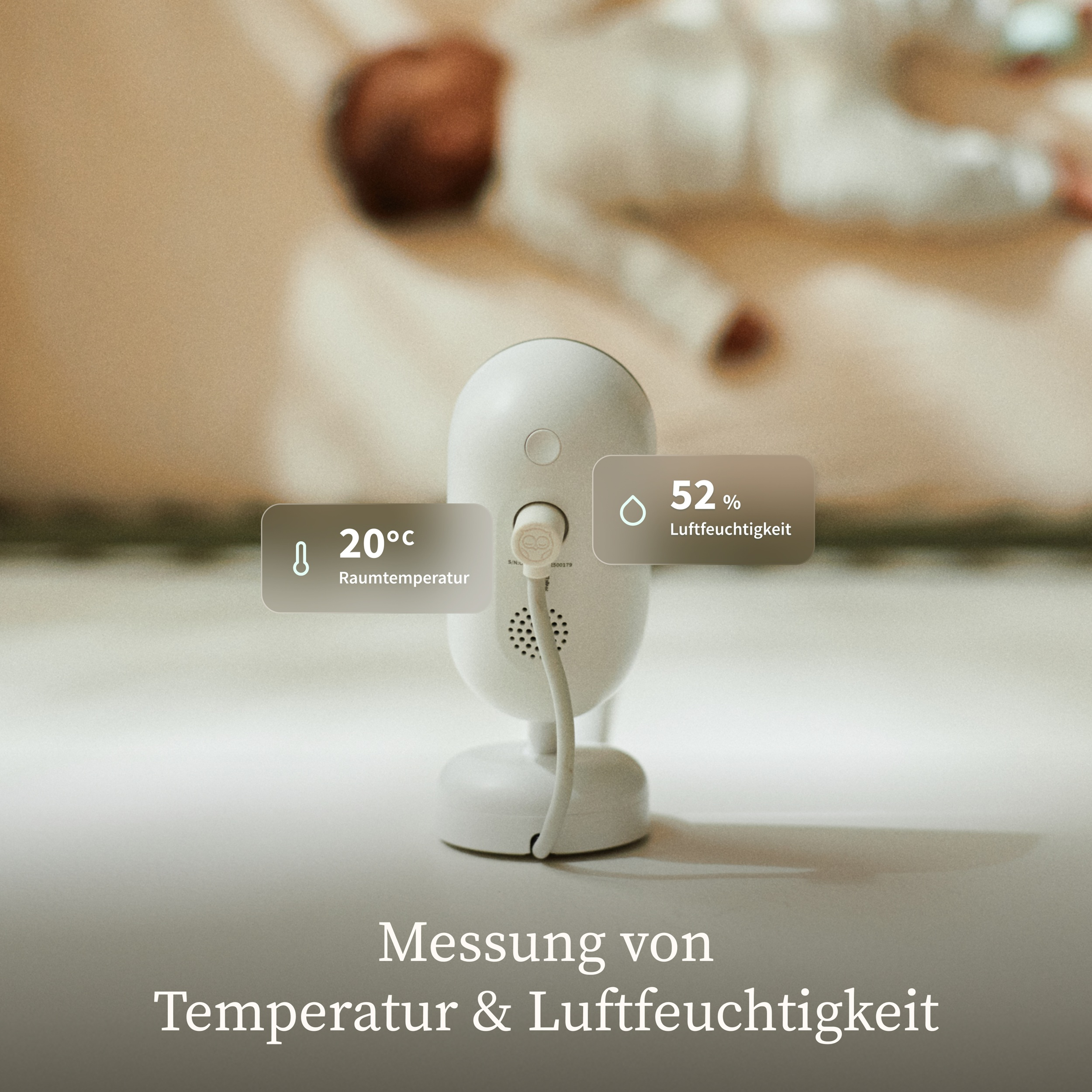 Ein Babyphone misst 20°C Raumtemperatur und 52% Luftfeuchtigkeit.