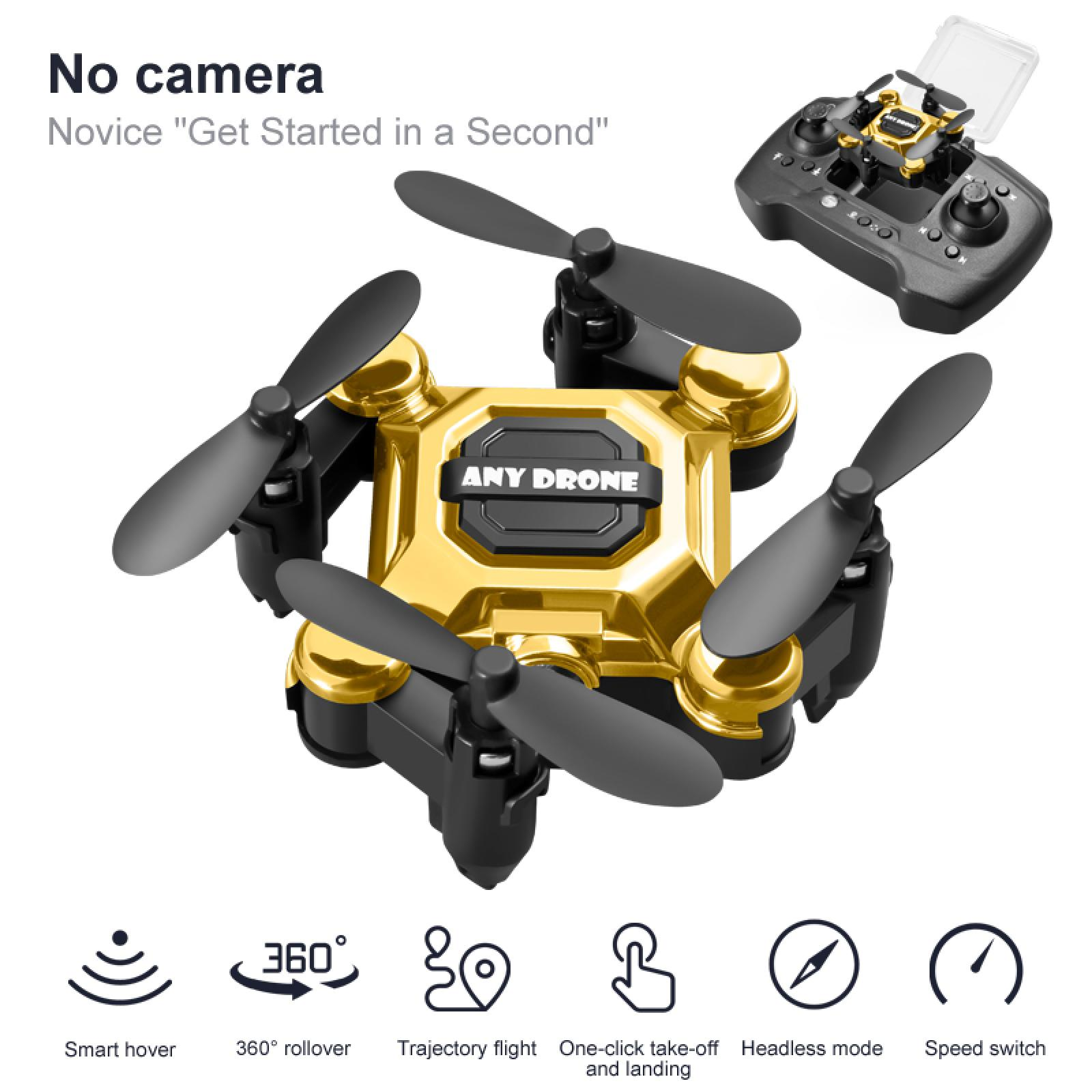 Goldener Mini-Drohne mit schwarzen Propellern und Fernbedienung.
