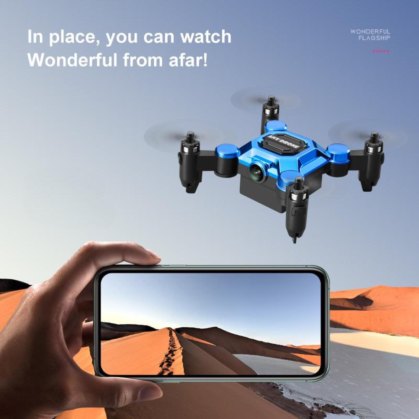 Blauer Mini-Drohne fliegt über Wüstendünen, wird auf einem Handy angezeigt.