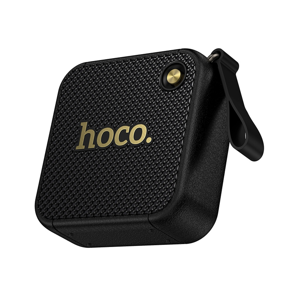Altavoz HOCO negro con logo dorado y correa.