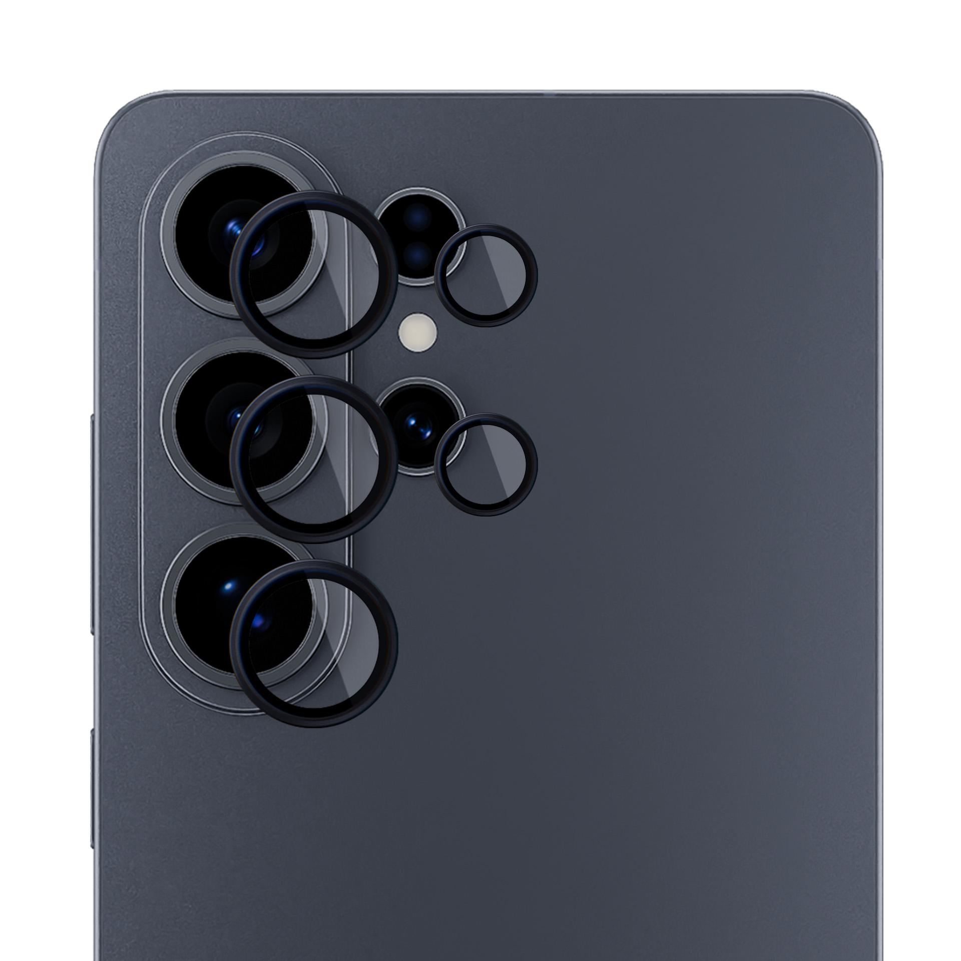 Scudi in vetro protettivo per fotocamere di smartphone su un telefono scuro.