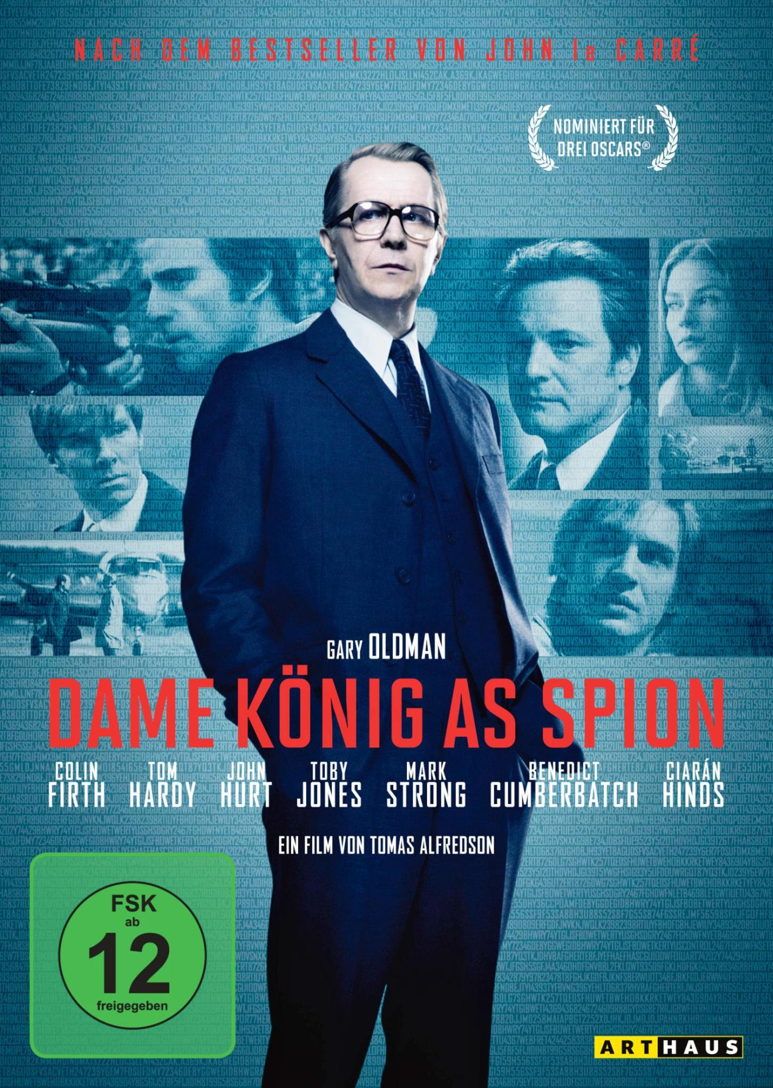 Gary Oldman in giacca, poster del film con altri attori.