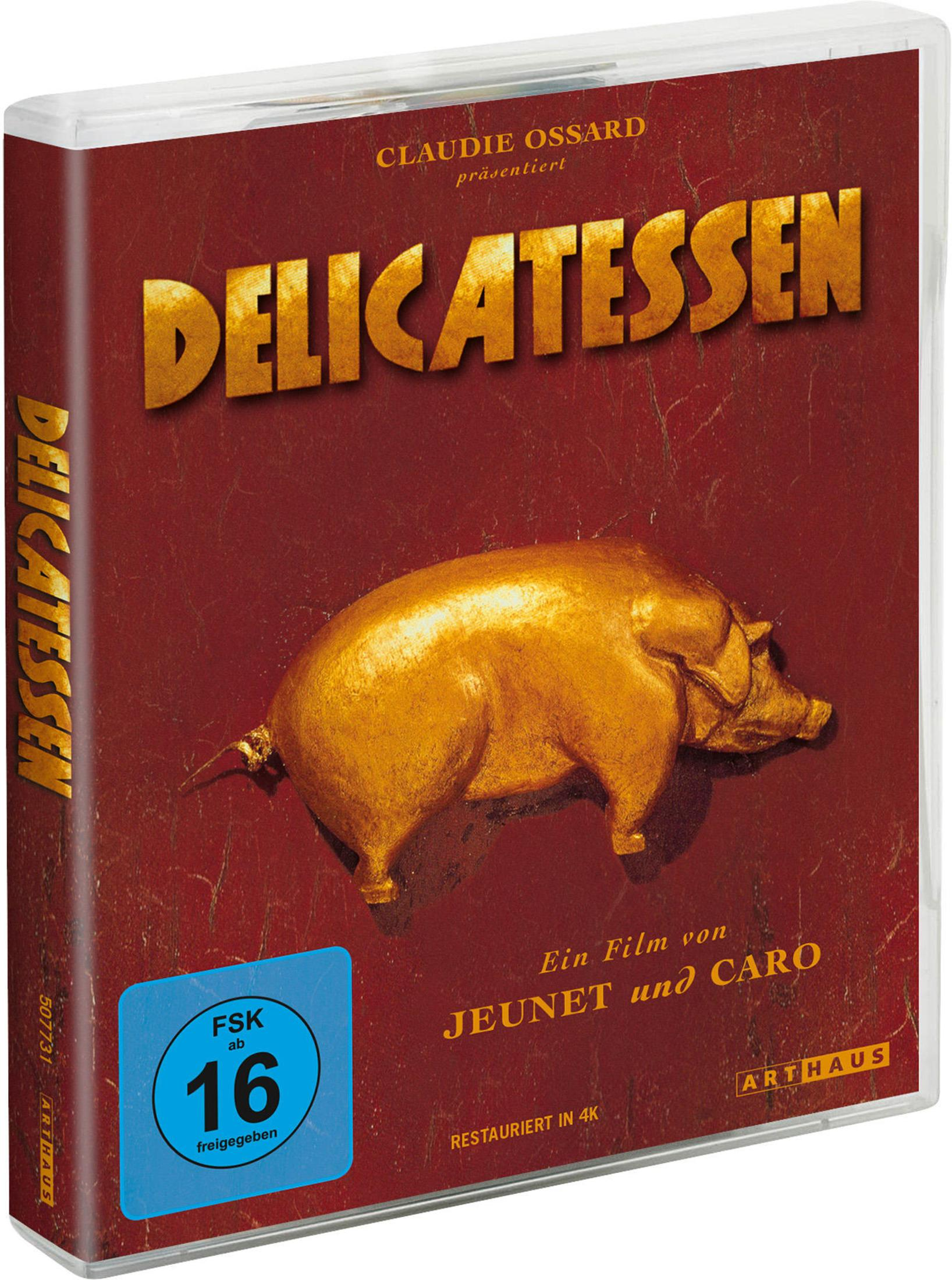 Copertina DVD: "Delicatessen" con maiale dorato, sigillo FSK 16.