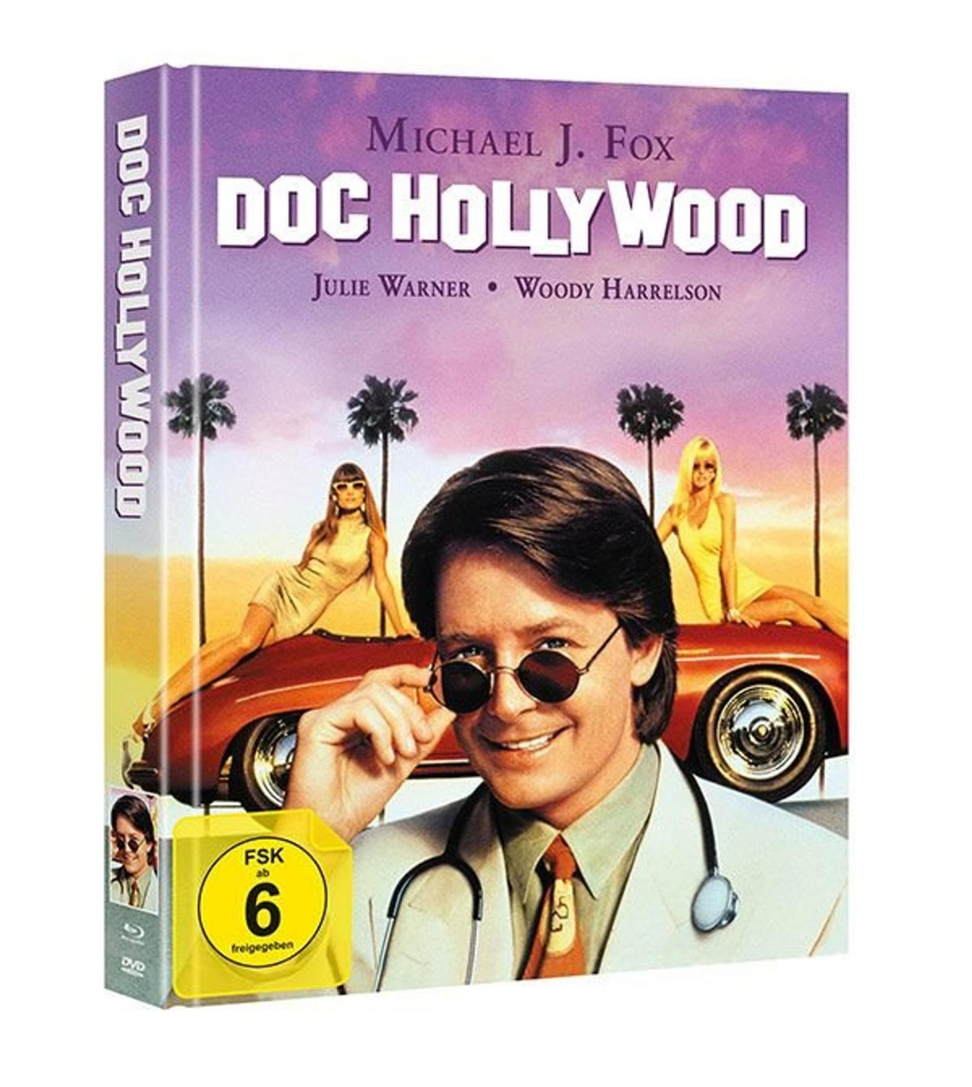 Copertina DVD: Michael J. Fox medico con due donne in auto rosse, palme.