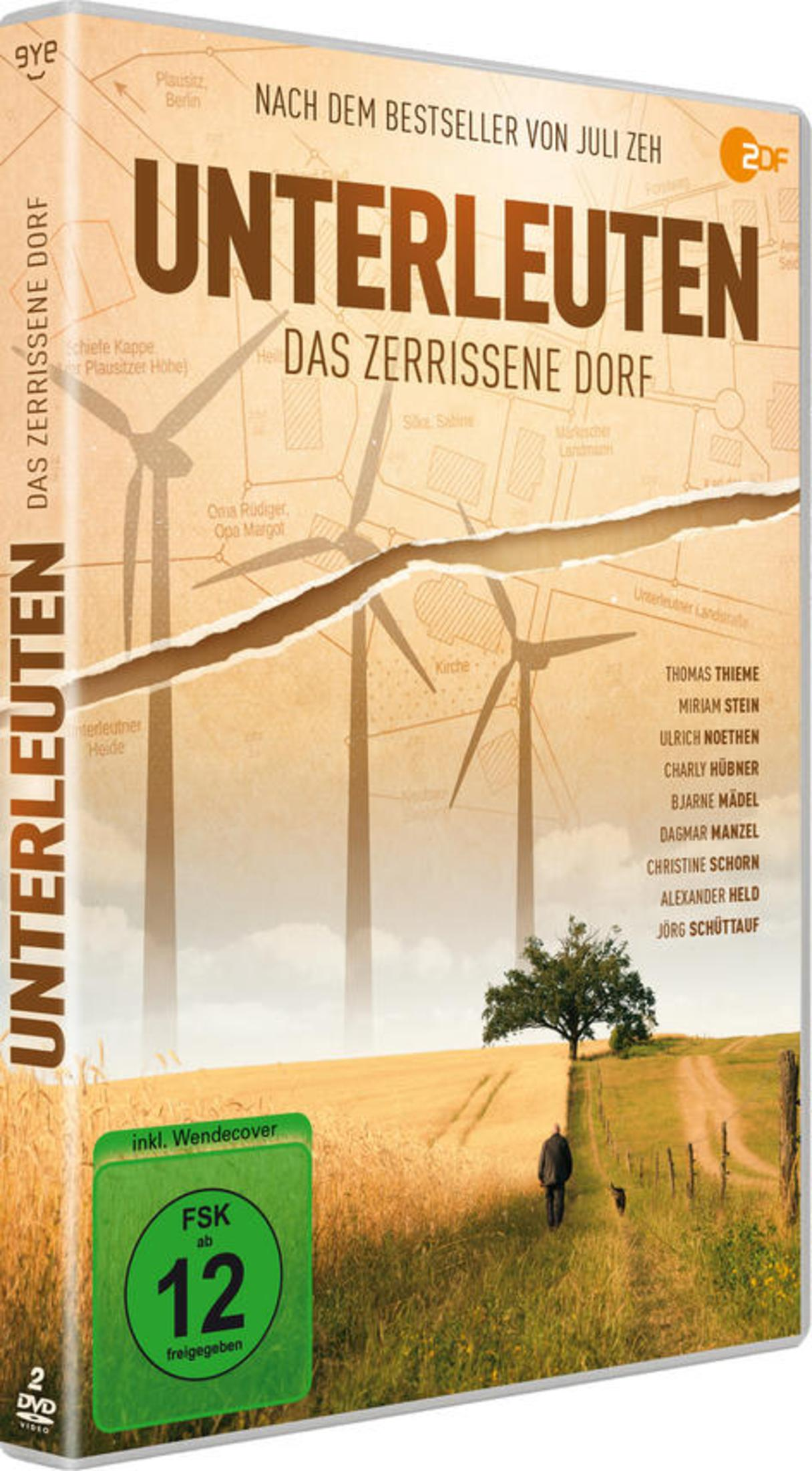 Copertina DVD: Uomo e cane su sentiero. Turbine eoliche e campo di grano sullo sfondo.