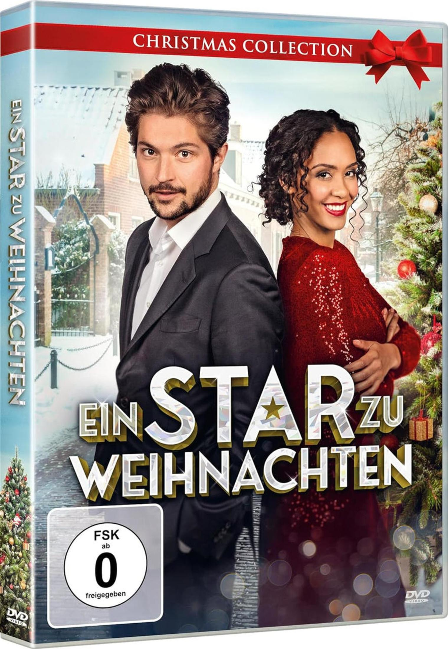 DVD film di Natale con uomo in abito e donna in vestito rosso, davanti albero.