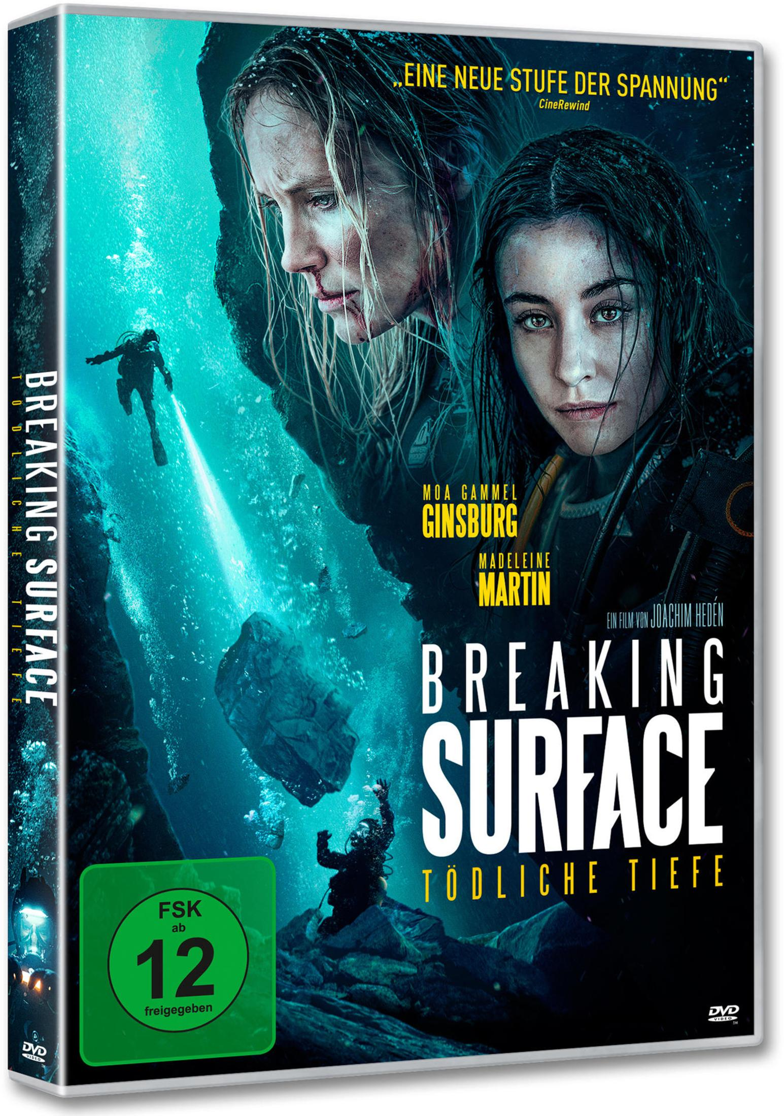 Due donne e subacquei sott'acqua. Titolo: Breaking Surface.