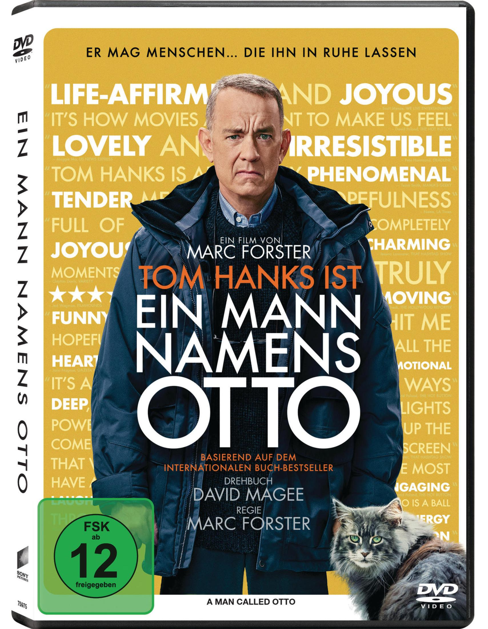 Tom Hanks guarda severamente sulla copertina di "A Man Called Otto" con un gatto.