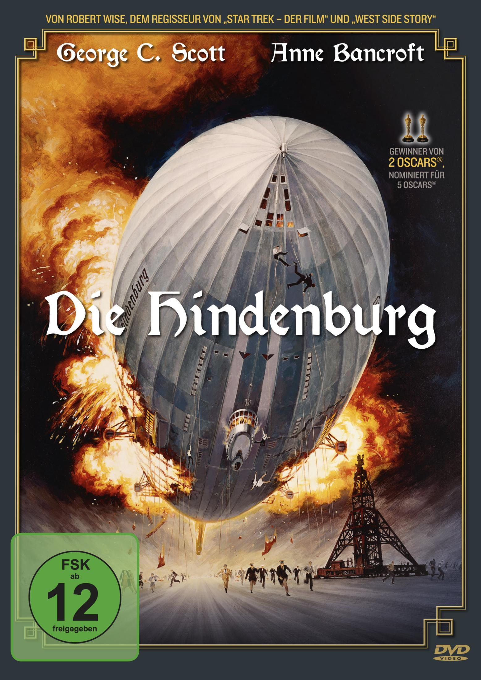 Il dirigibile Hindenburg esplode in fiamme mentre la gente fugge.