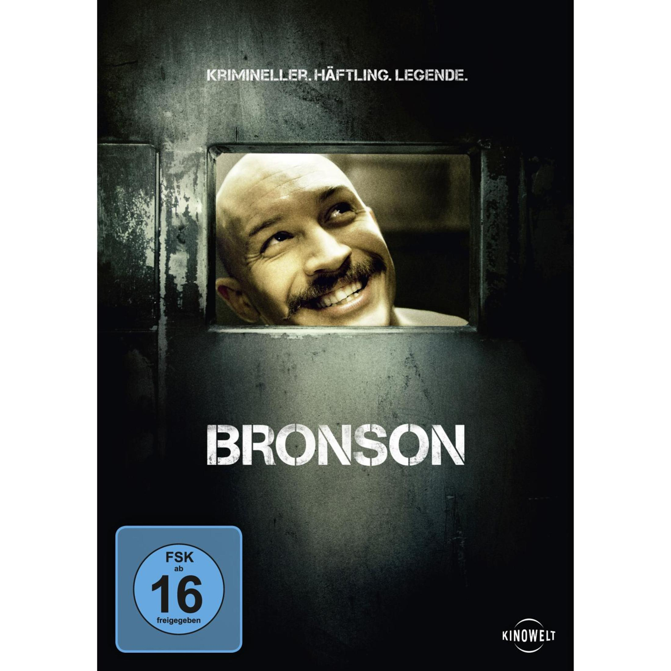 Ein Mann mit Glatze und Schnurrbart blickt durch ein Gitter. Der Filmtitel BRONSON steht groß da.
