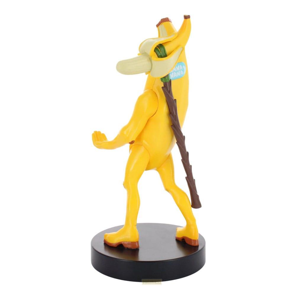 Una figura di banana gialla con un bastone su una base nera.