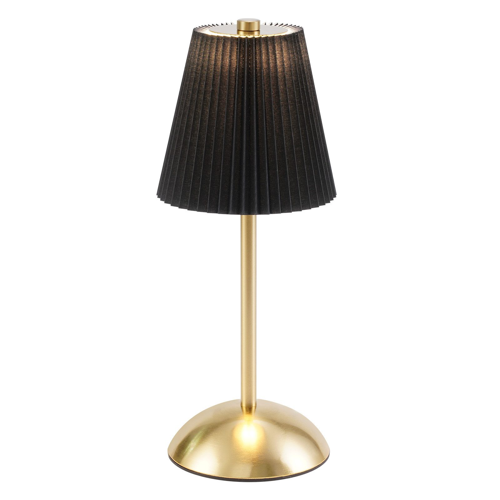 Una lampada da tavolo dorata con paralume nero plissettato e base rotonda.