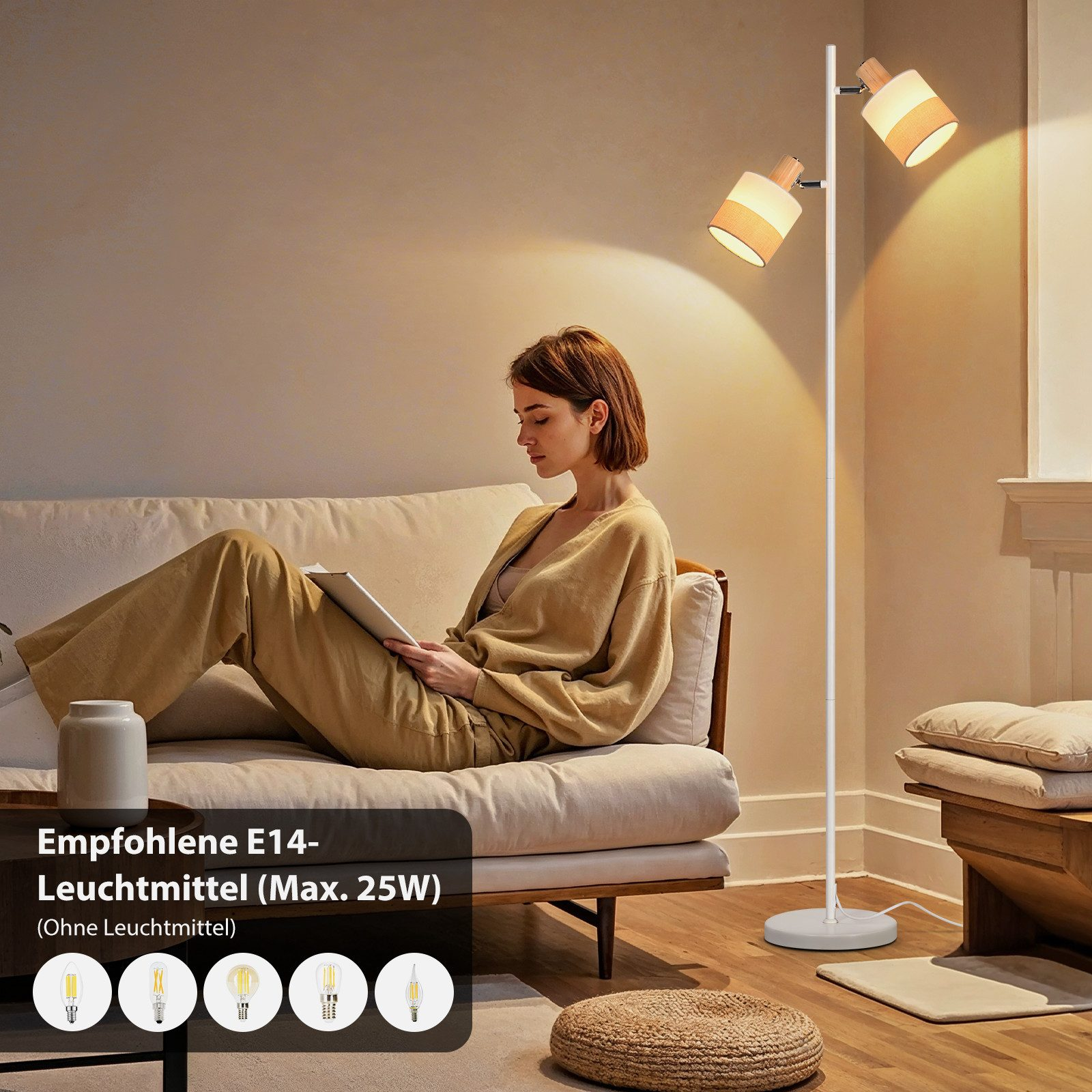 Donna su divano legge tablet, lampada da terra con due paralumi accanto. Lampadine raffigurate.