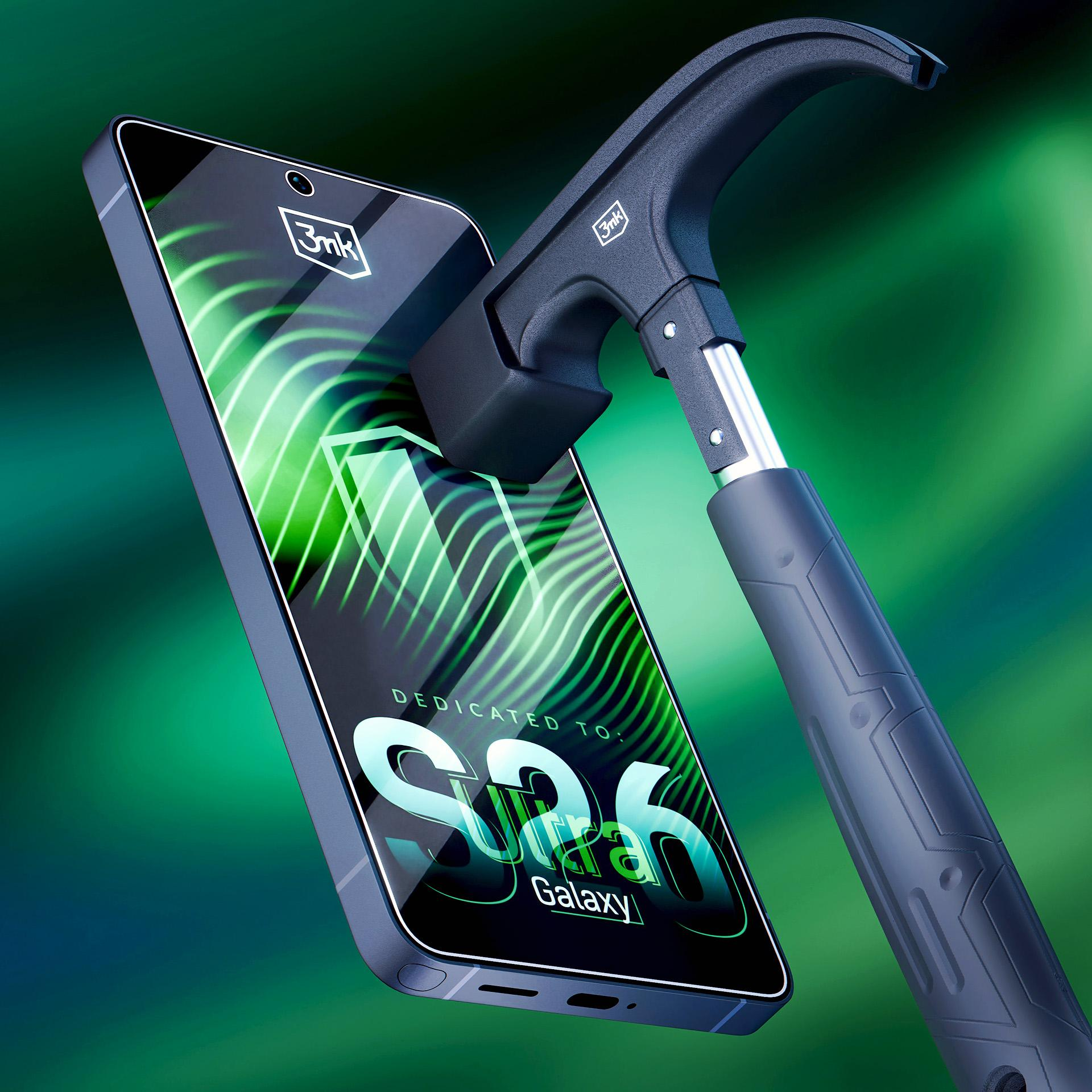 Czarna główka młotka naciska na ekran smartfona z zielonymi falami.