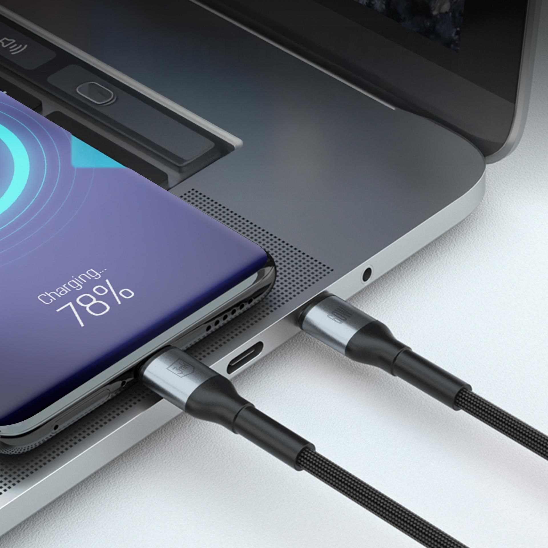 Smartfon jest podłączony do laptopa za pomocą kabla USB-C.