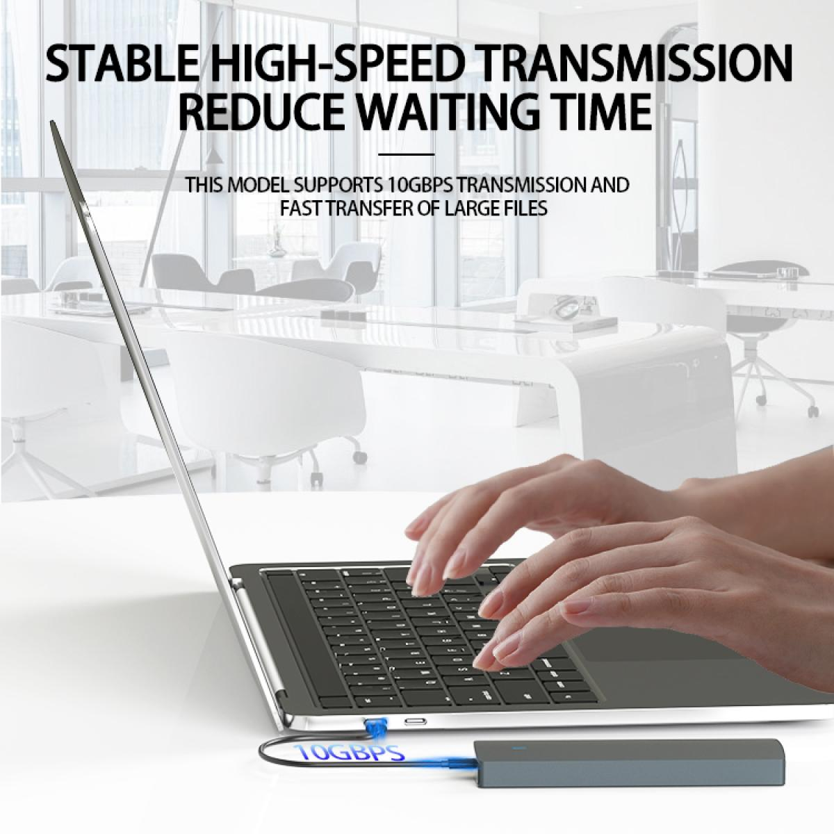 Hände tippen auf Laptop, 10Gbps-Gerät verbunden, Büroumgebung.