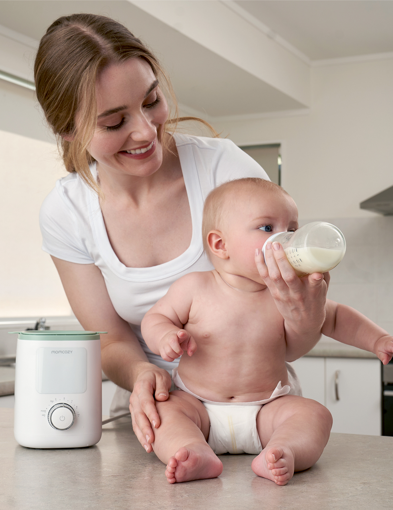 Momcozy Nutri 9-in-1 Babyflaschenwärmer mit Nachtlicht, präzise Temperaturregelung, bewahrt die Nährstoffe in Muttermilch, kompatibel mit allen Flaschengrößen | Flaschenfütterung