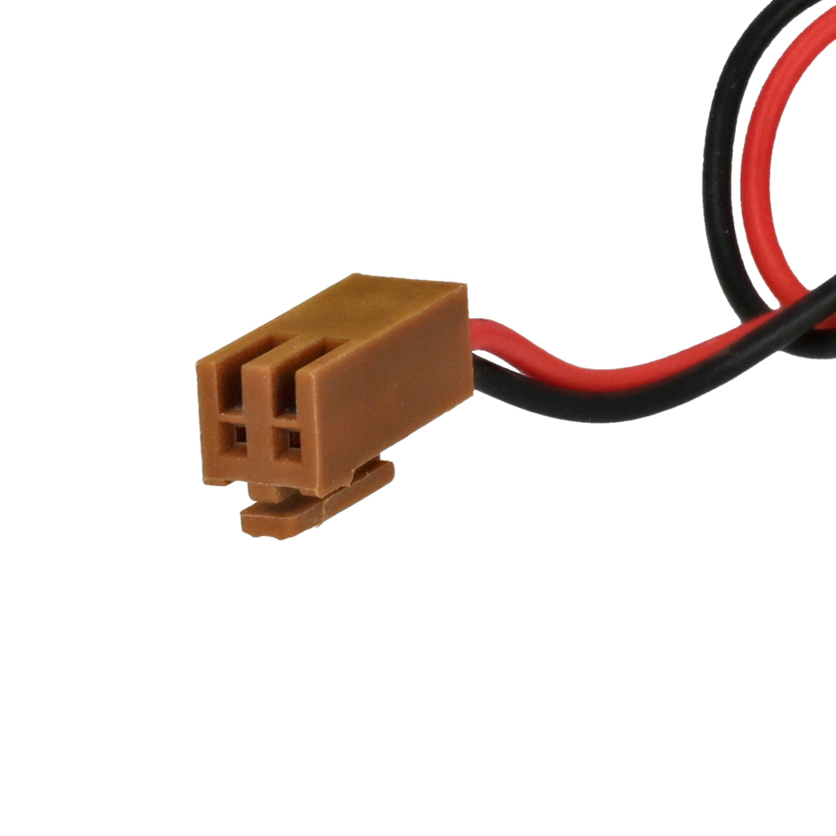 Ein brauner Kabelstecker mit roten und schwarzen Kabeln auf weißem Hintergrund.