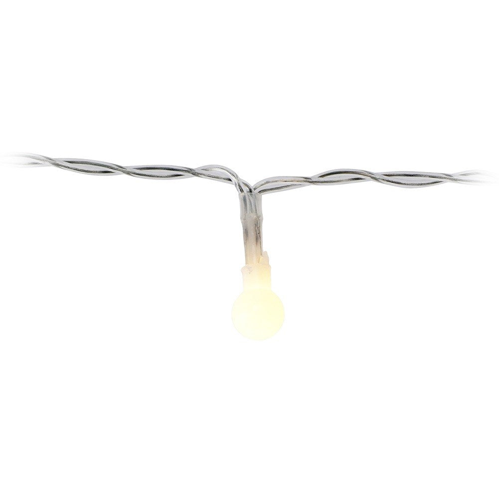 Una sola luz LED blanca cálida en un hilo fino.